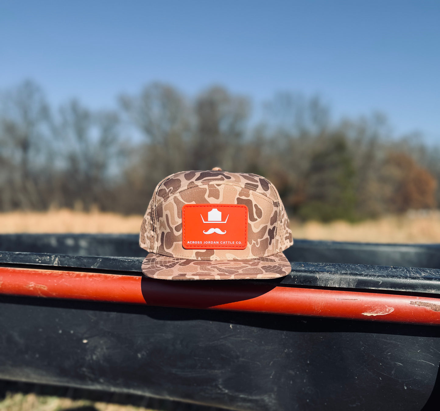 Camo Performance Hat with red rubber patch